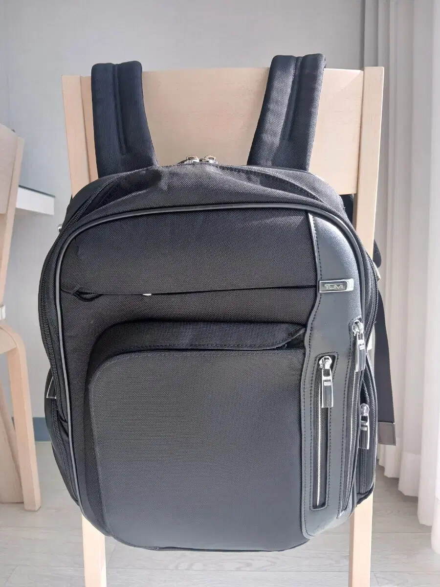 Tumi men's durable travel backpack for work and daily use