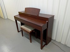 Yamaha Clavinova CLP-440 Digital Piano and stool in mahogany stock no 25520