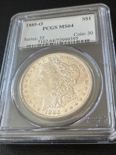 1885-O Morgan Silver Dollar. PCGS MS64. Valued At $150.