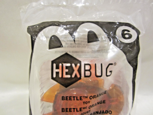McDonald's Happy Meal giocattolo HEXBUG #6 scarabeo arancione in bustina sigillata 2013 - Foto 3 di 13