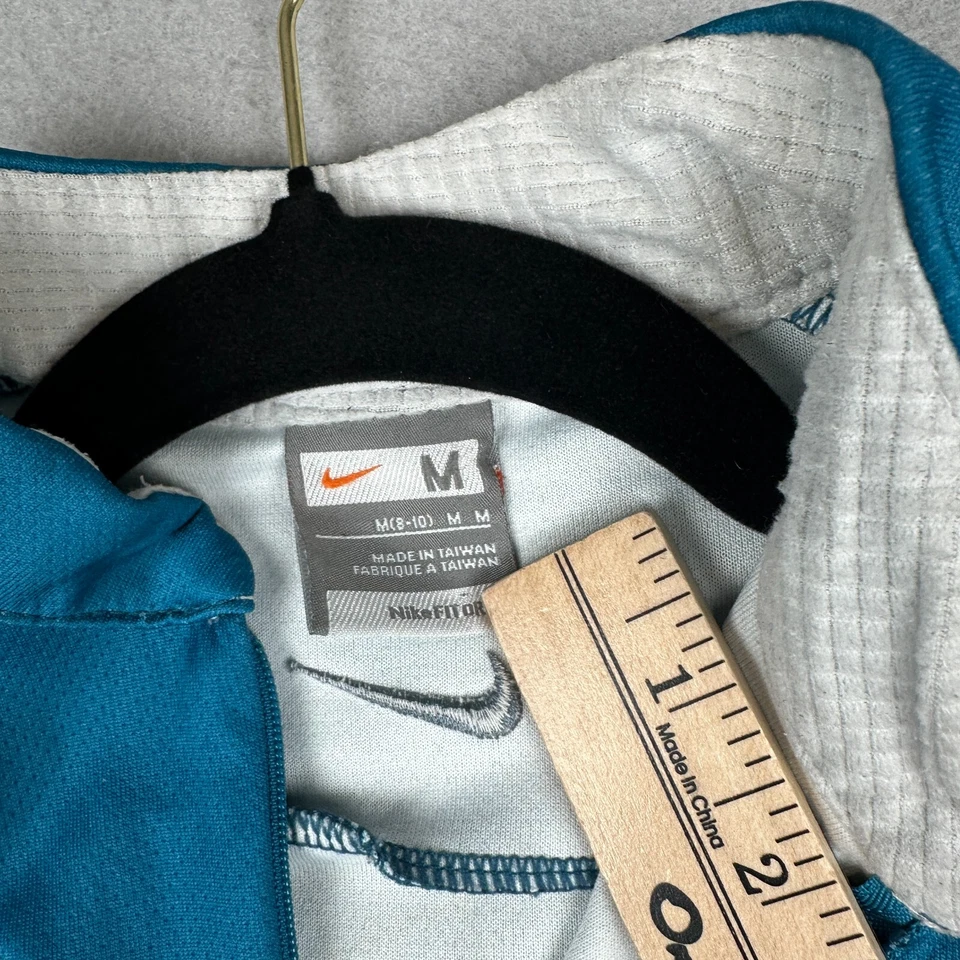 Camiseta deportiva de ciclismo Nike para mujer mediana verde azulado abstracta 1/2 cremallera Y2K tejido gofre Foto 3 de 4