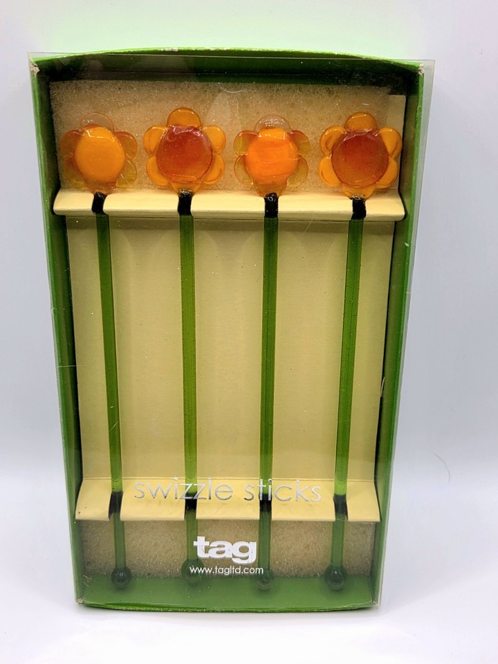 Never-used TAG blown art glass flower stirrers — delicate enough to double as miniature floral sculptures.
