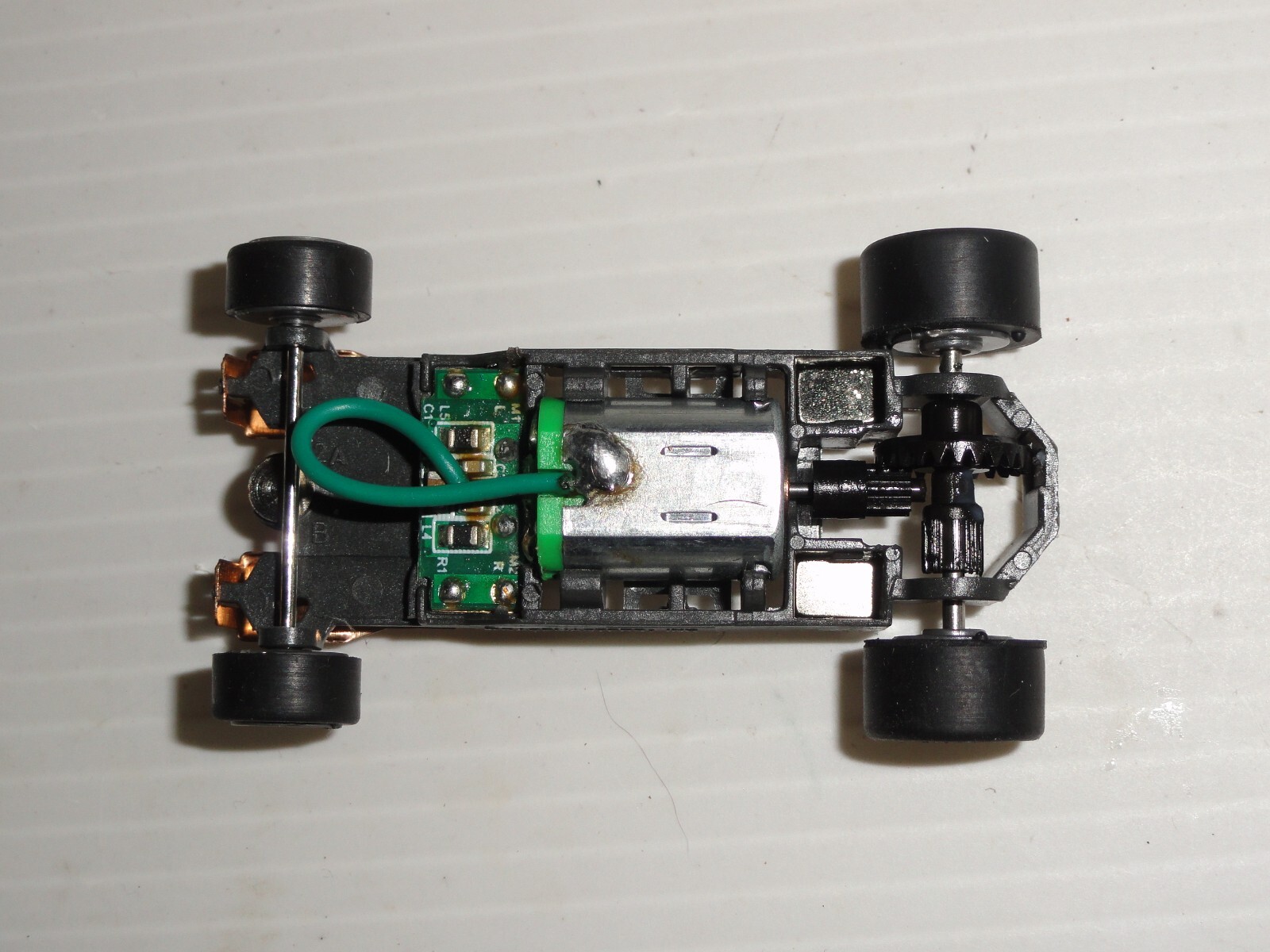 AFX MEGA G+ HO SLOT 1.7 Long NARROW CHASSIS GRAY 5 SPOKE RIMS AND TIRES