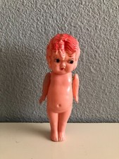 Vintage celluloid string jointed arms Kewpie Doll