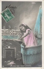 CHRISTMAS CP I THINK I HEARD IT - LITTLE GIRL CRADLE FIREPLACE - 38583