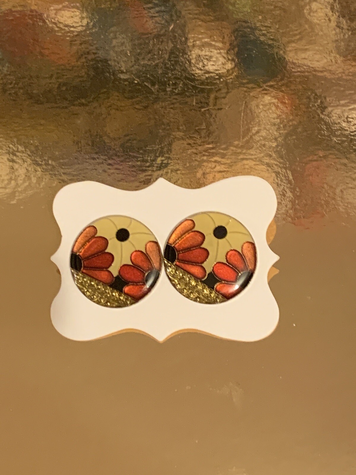 Stud Earrings 1” Approx. Red Flowers With Gold Band-image