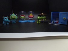 Assorted Disney Character Figurines (Monsters, Inc., Inside Out, Lilo & Stitch)