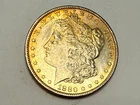 1880-S Morgan U.S. silver dollar. Very choice BU, pretty gold hue. #ar1