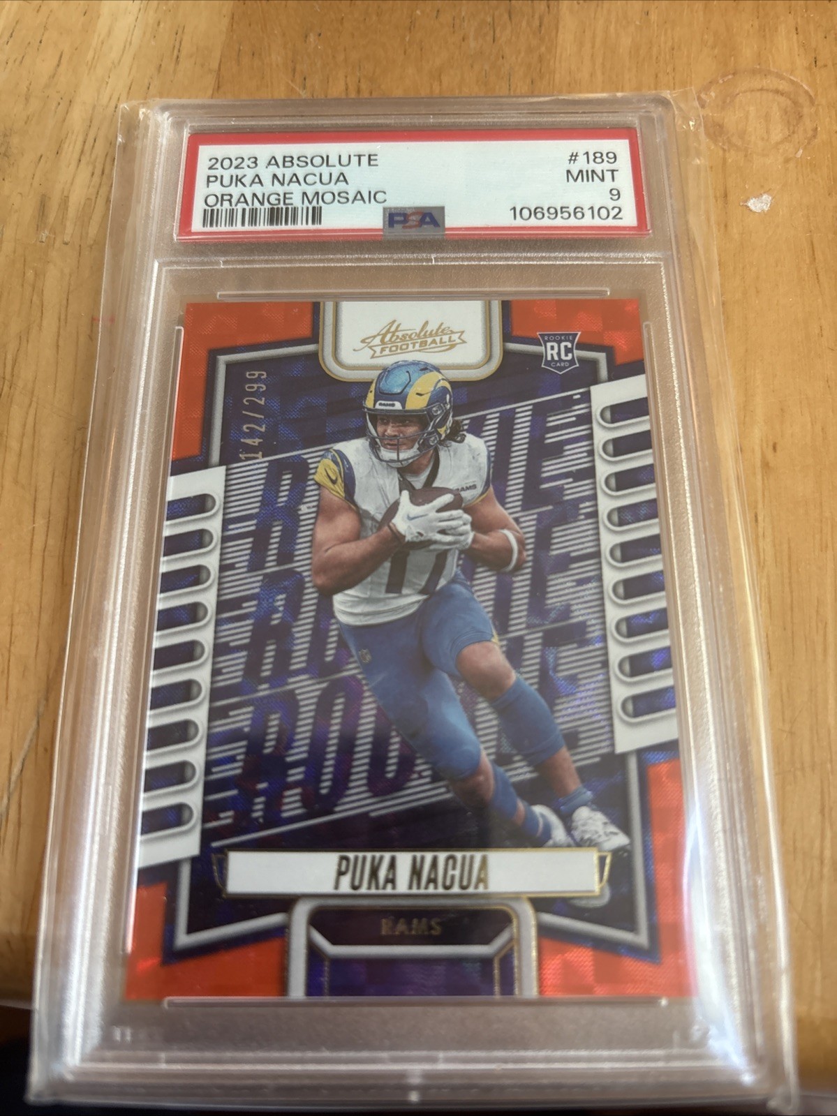 2023 Panini Absolute - Rookies Puka Nacua #189 Orange Mosaic /299 (RC)