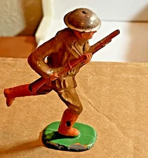 Barclay Dimestore soldier Charging with Rifle