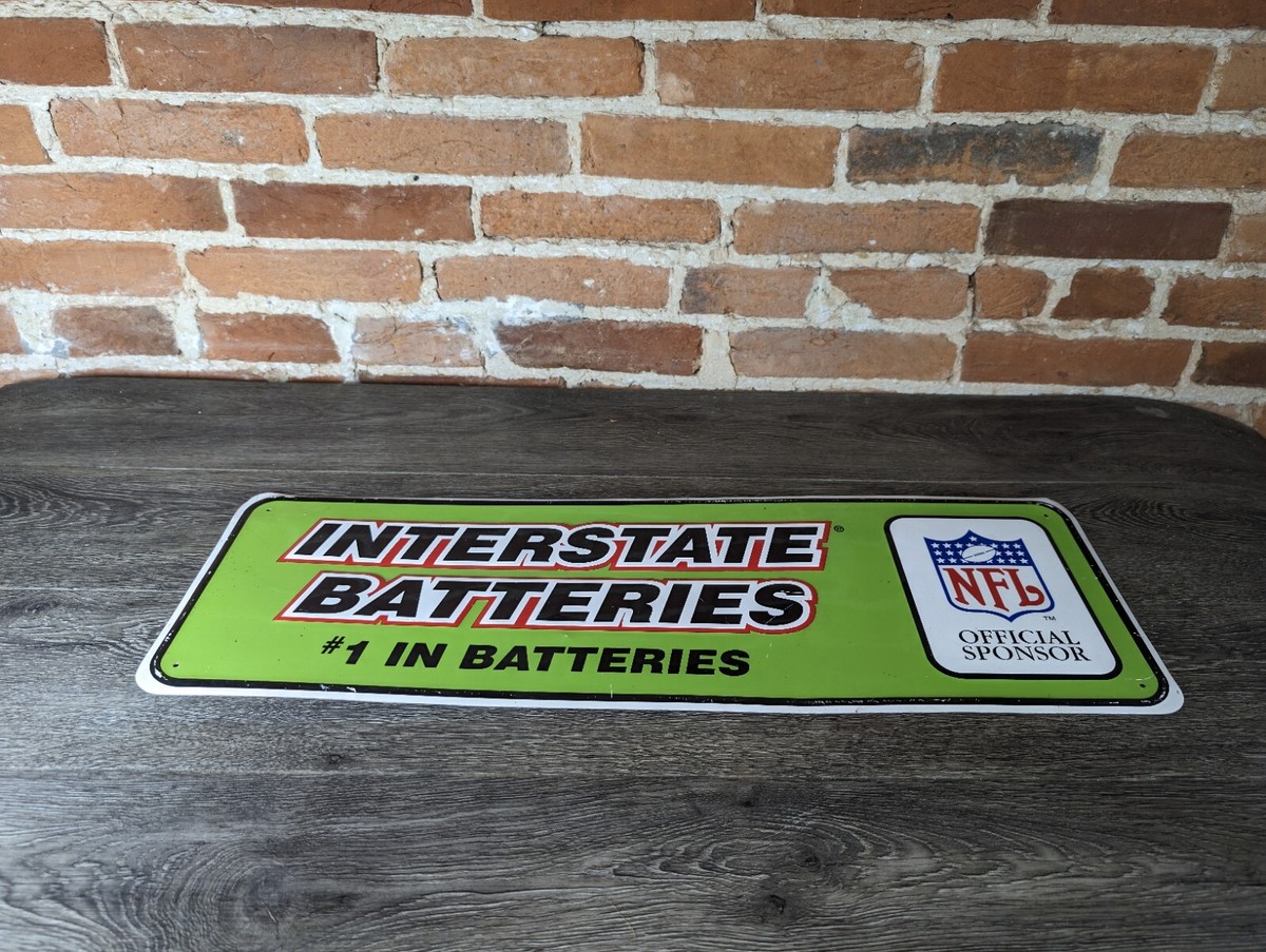 VINTAGE INTERSTATE BATTERIES BATTERY NFL EMBOSSED METAL SIGN AUTO