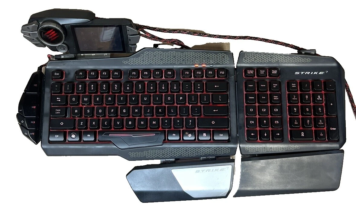 Черные компьютерные игровые клавиатуры и кнопочные панели Mad Catz