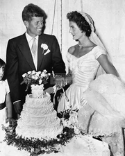 JOHN F. KENNEDY AND NEW WIFE JACQUELINE CUT WEDDING CAKE - 8X10 PHOTO (AB-223)