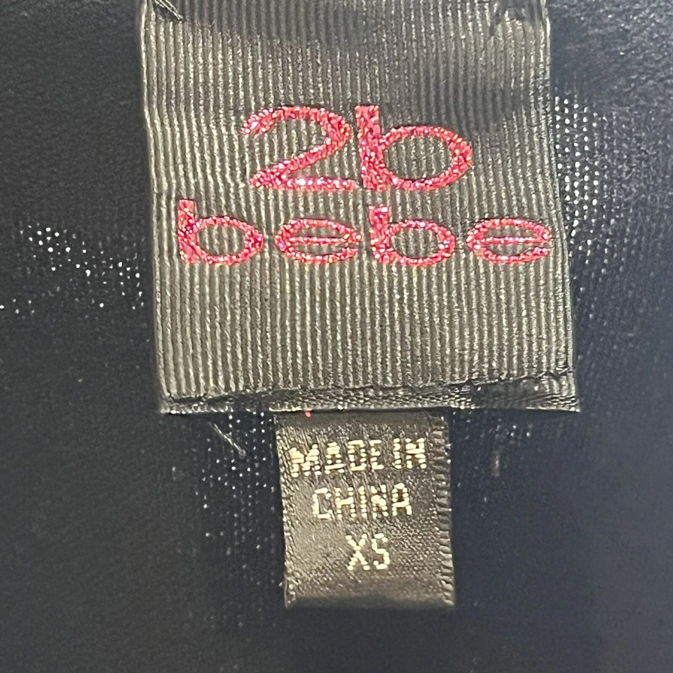 Top suéter de manga corta con cuello redondo y lentejuelas negras bebe para mujer Foto 3 de 4