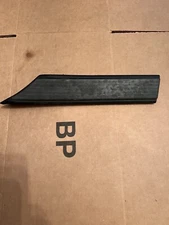 1986.5 - 1988 Toyota Supra MK3 Driver front of rear tire trim maroon 75652-14130