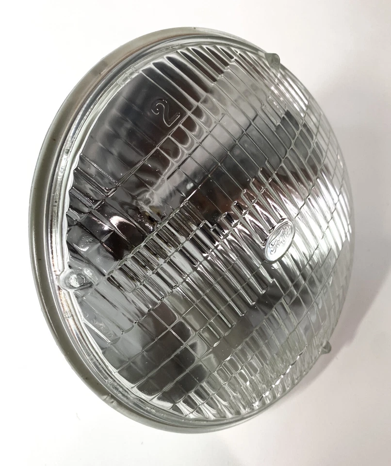 Par de faros halógenos de haz sellado de 7 pulgadas con logotipo de Ford estampado Foto 4 de 4