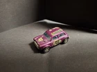 CorgiThis is a vintage Corgi Juniors Whizzwheels  Vita-Min 1300 Mini Cooper