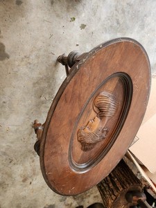 Antique Oval Wood Accent Table with Carved Portrait, Traditional Style