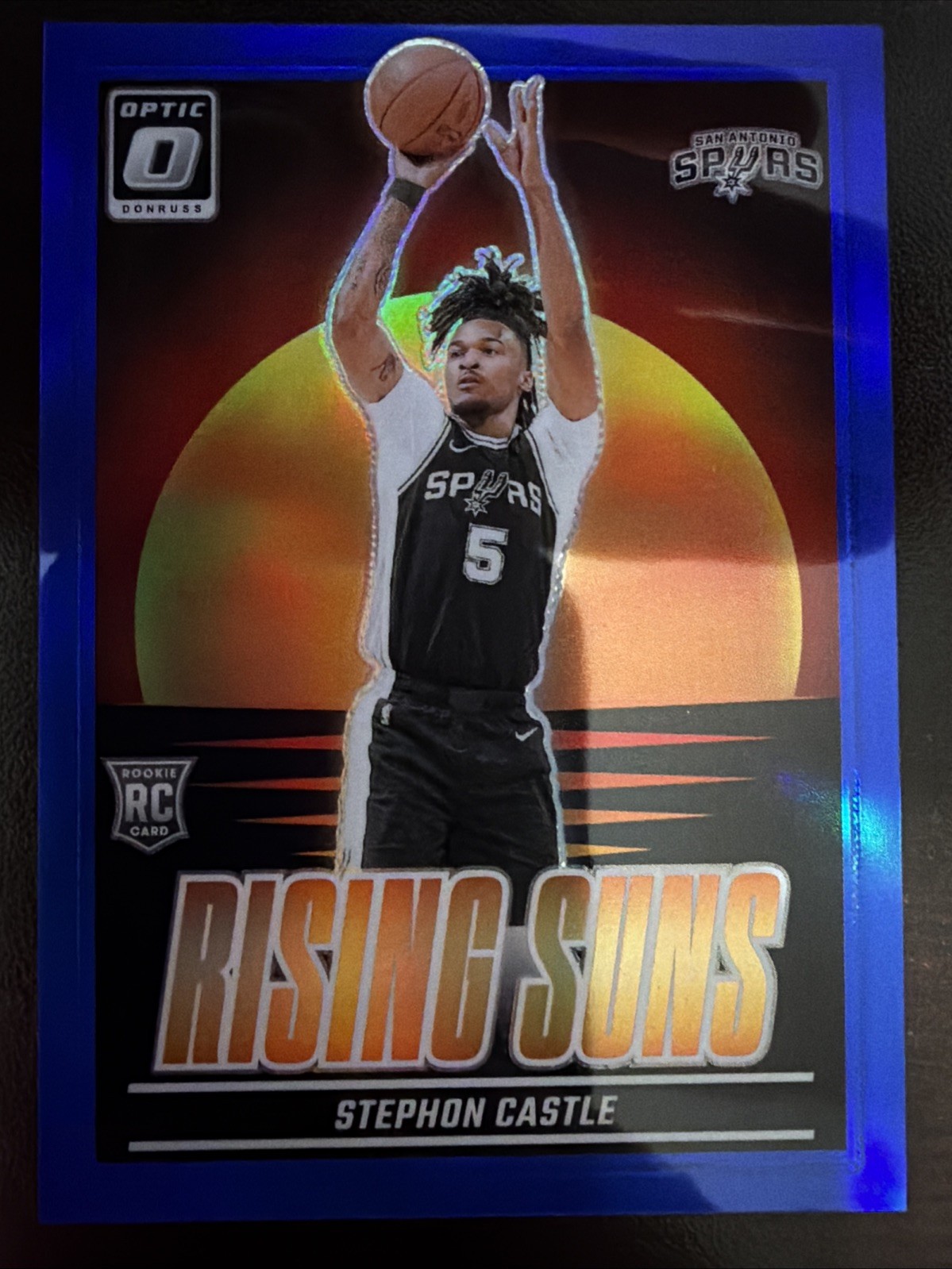 1st on Print -2024-25 Donruss Optic Blue Rising Suns /49 Stephon Castle RC Spurs