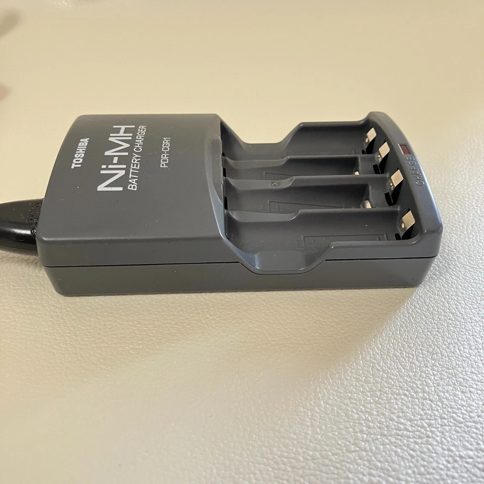 Cargador de batería Toshiba PDR-CGR1 Ni-MH para cámara fotográfica digital PDR-T15 100 V Foto 3 de 4