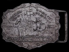 IC11172 VINTAGE 1970s LIVINGSTON WELLS CO GOLD DEALERS BUCKLE