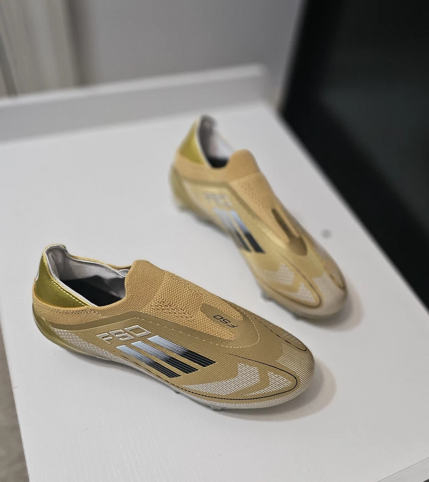 Botines de fútbol Adidas F50 Elite FG para niños color dorado Foto 3 de 4