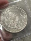 1885-O $ STRUCK THOUGH OBVERSE MORGAN SILVER DOLLAR “HIGH GRADE” “GREASE ERROR”
