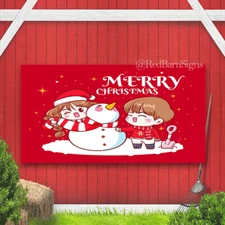 Couple making snowman together merry Christmas banner