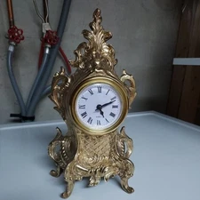 Vintage French Gilt Clock W/ New Battery Powered Movement. Bright, shiny brass!