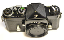 Nikon black F 35mm body with a black standard finder.