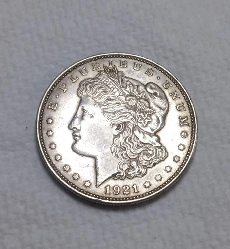 1921 Morgan Silver Dollar. Estimated Uncirculated Mint State 60/61. Video M0010.