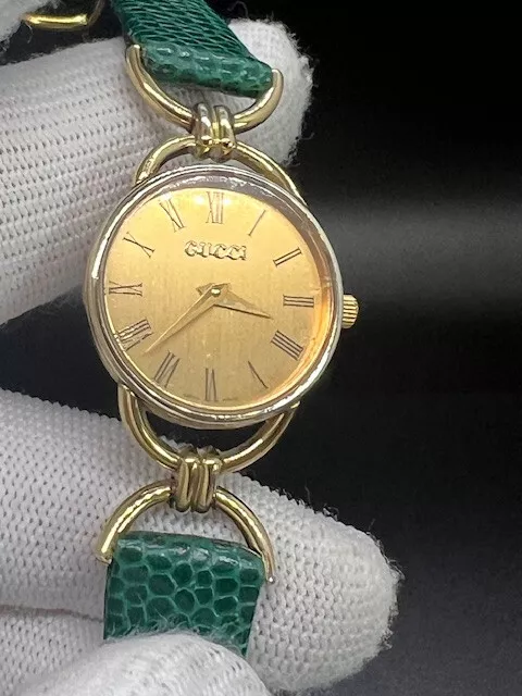 Magnifique montre femme 23 mm Gucci 6000,2,2,L Sherry Line boîtier doré et cadran QZ