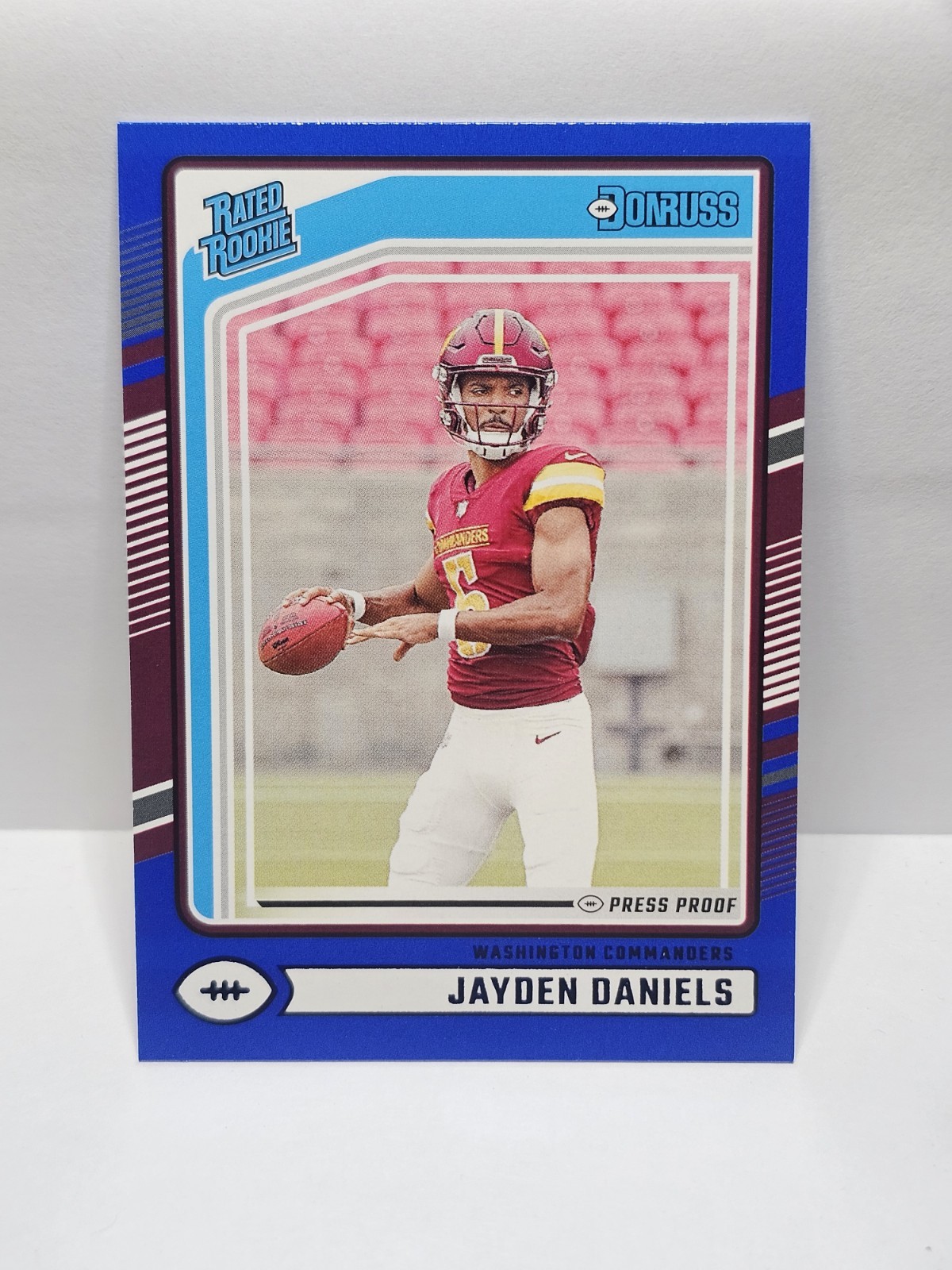 2024 Panini Donruss - Rated Rookie Jayden Daniels #389 Blue Press Proof (RC)