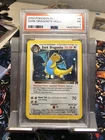 2000 Dark Dragonite 5/82 5 Team Rocket Holo PSA 1 w/ Swirl