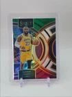 LEBRON JAMES 2023-24 SELECT PREMIER LEVEL GREEN WHITE PURPLE LAKERS Q4751