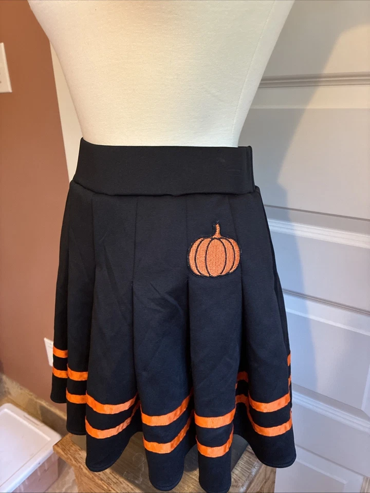 Falda Plisada Calabaza Spirit Halloween Rayas Negras Naranja Talla Pequeña (Talla 27) Foto 2 de 4
