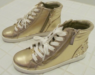 gold and white high tops
