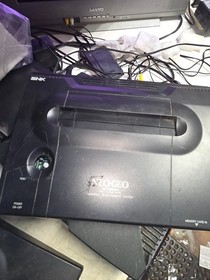 NEO GEO AES CONSOLE SYSTEM FOR PARTS OR REPAIR  POWERS ON NO CLEAR PICTURE #M24