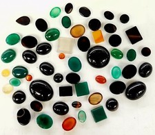 lot of 100 Carats of assorted loose gemstones varied sizes and shapes Cabochon