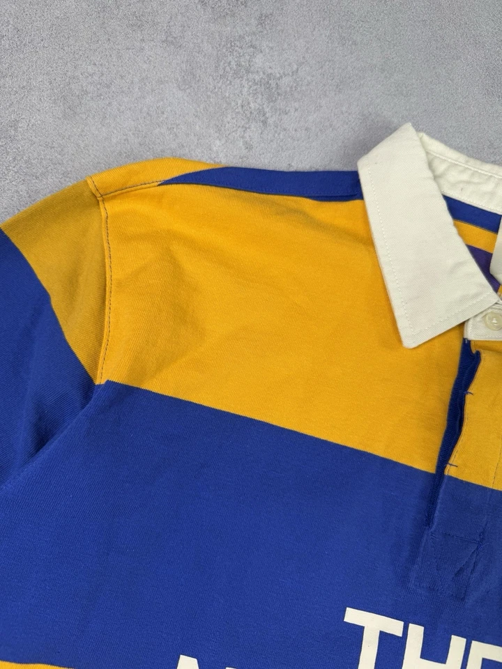 Polo de rugby The North Face bloques de colores azul/dorado talla L a rayas Foto 3 de 4