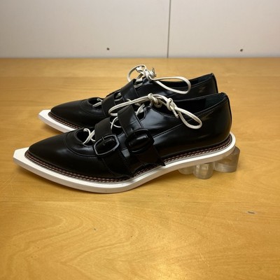 Simone Rocha Schuhe mit Blumenabsatz schwarz