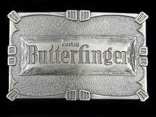 SJ11110 NOS VINTAGE 1970s  BUTTERFINGER  CANDY BAR ADVERTISEMENT BELT BUCKLE