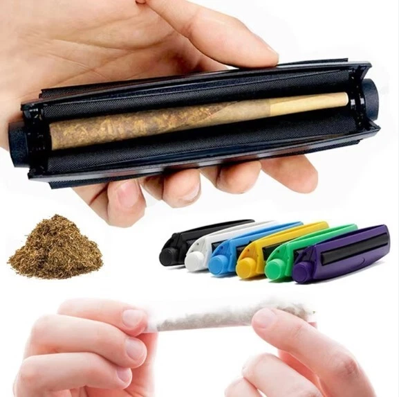 Hand holding a black Flower King Size Rolling Machine and 6 other colors (green, yellow, purple, blue, white, and black) of Rolling Machine for display