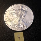 1 ounce silver eagle, uncirculated U.S. mint coin.