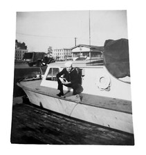 WW2 Era Photo U.S. Navy Sailor kneeling On Small Boat