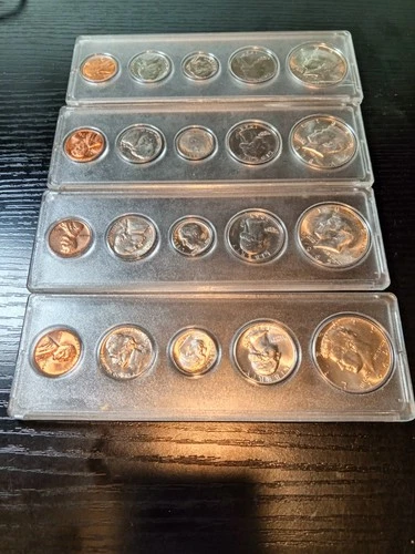 4 silver Kennedy half mint sets. Uncirculated. Nice. 1964, 65, 68,69No reserve.