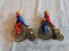 Tomy brand wind-up toys from the 1970s w/ a clown riding a bicycle.  Set Of 2 