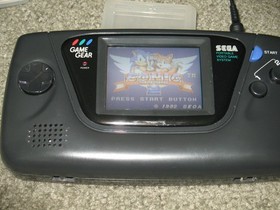 Sega Game Gear Set: Console, TV Tuner, Case, Battery Pack, Power Supply, 2 Games