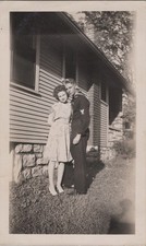 WW2 Photo of Sailor Embracing Young Woman Beside House