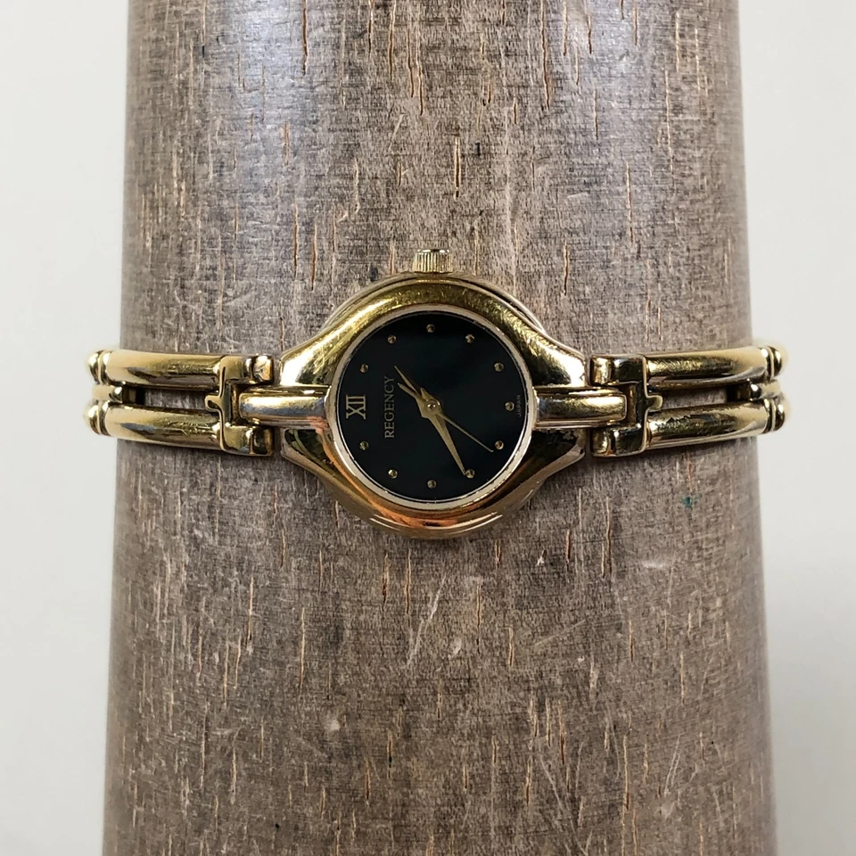 Reloj analógico de cuarzo vintage Regency para mujer 7144 moda tono dorado 19 mm 7" Foto 2 de 4